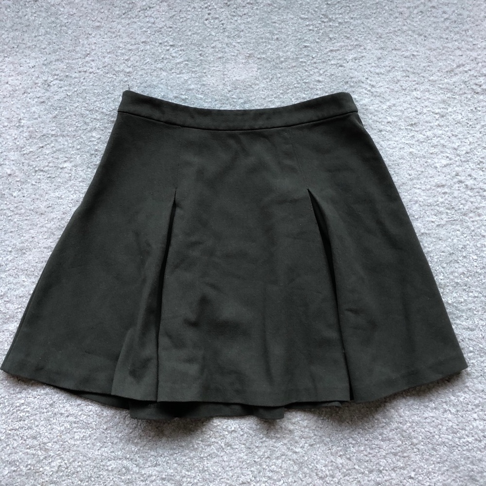 Olive green a-line pleated skirt.
